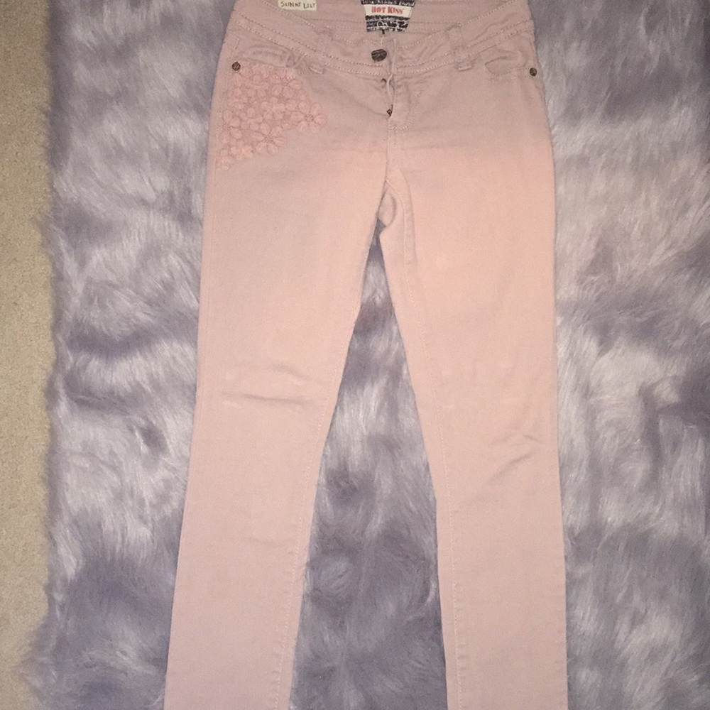 Light pink/rose jeans with floral pocket detail